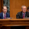 Sens. Ron Wyden (D-OR) and Mike Crapo (R-ID) preside over a Senate Finance hearing. Senator Wyden is speaking. 